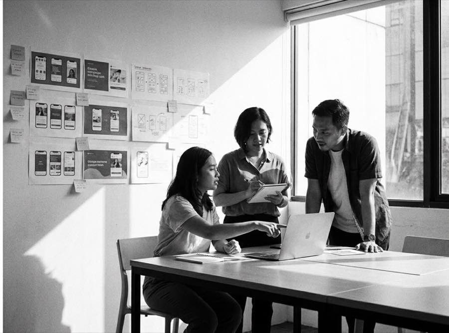 BIG In Digital team reviewing campaign mockups in the Jakarta studio